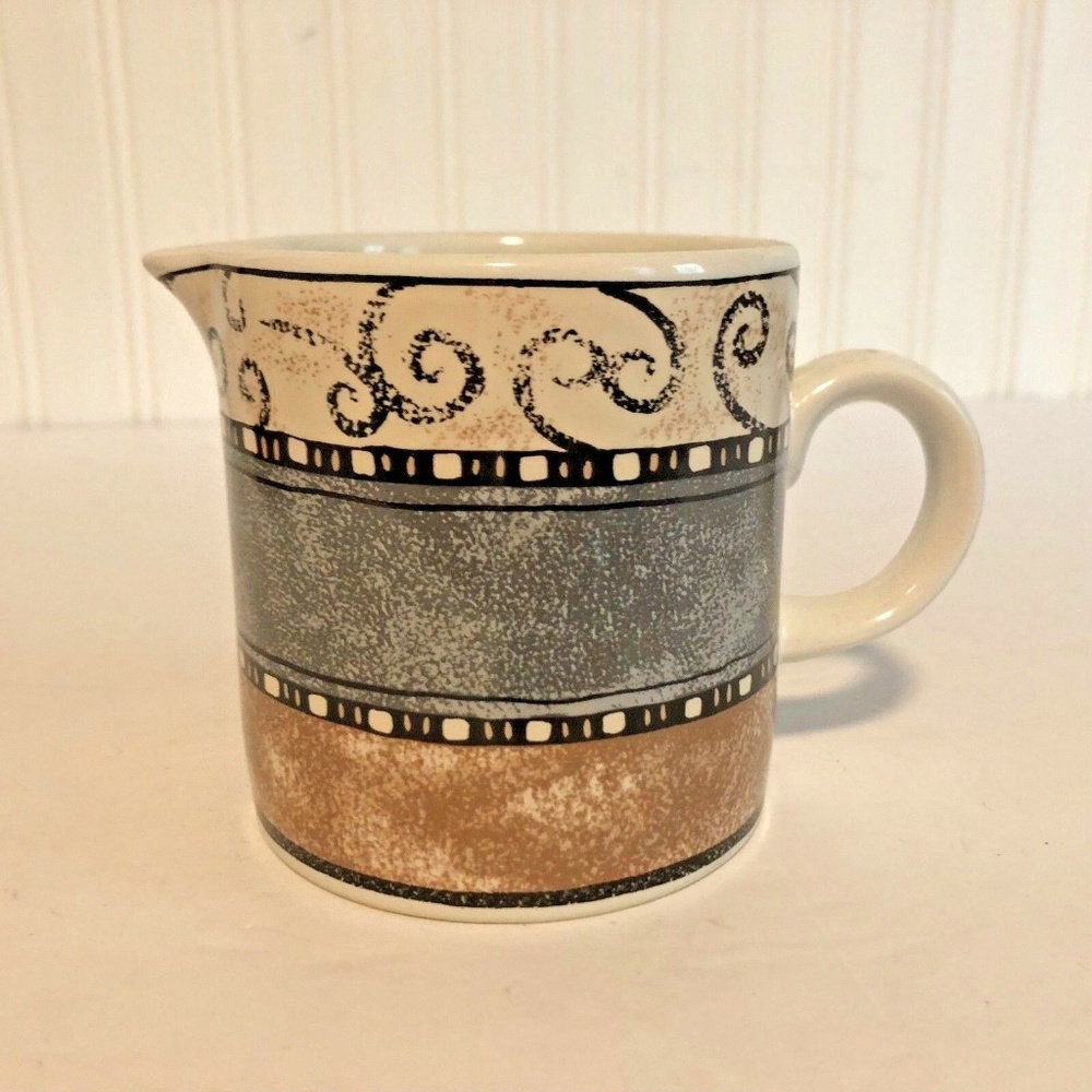 Sakura Sue Zipkin Terrain Creamer 1997 tan brown